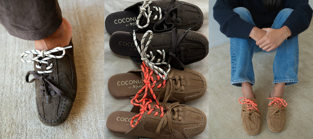 Brown moccasin shoes with colorful laces displayed on a light surface.