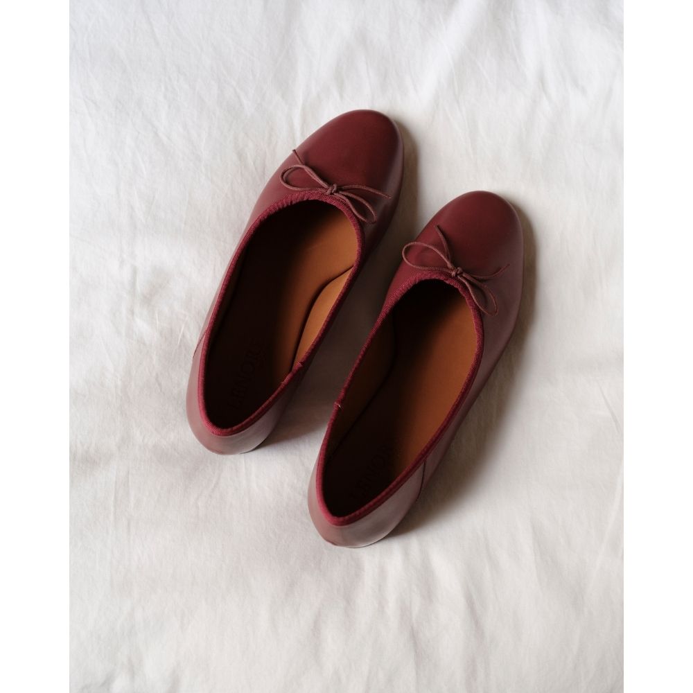 Marie Ballet Flat - Lenore by Matisse - Wine leather ballet flats with a classic round-toe silhouette, delicate bow detail, and padded leather insole. A timeless essential for effortless everyday elegance.