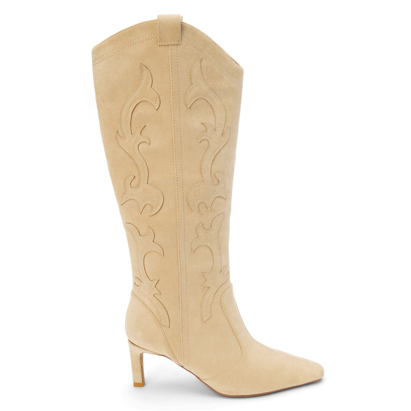 Abrams Western Boot – Coconuts by Matisse – Tall vegan suede boot in a soft beige tone with western-inspired stitching, pointed toe, and slim high heel.