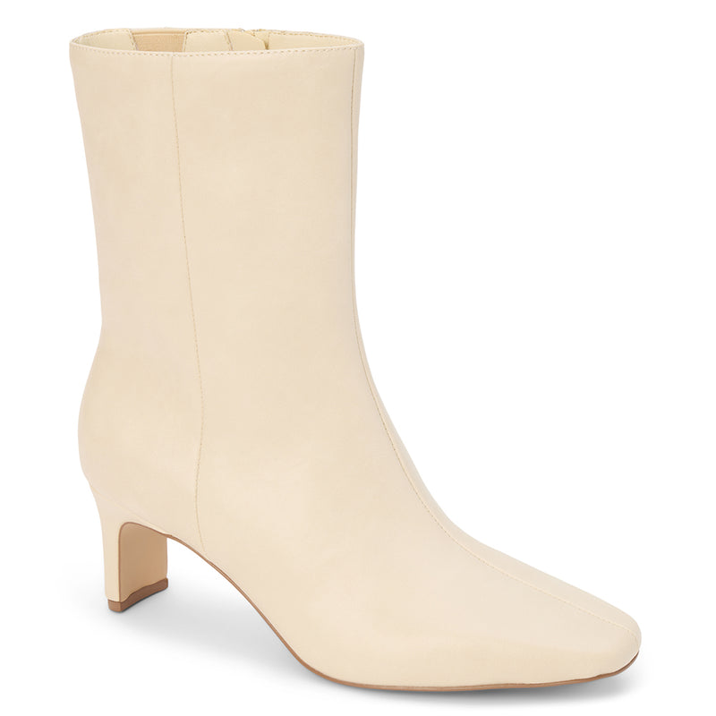 Adler Ankle Boot - Beach by Matisse - Ivory vegan leather ankle boot with a pointed toe, slim mid-heel, and minimalist silhouette.