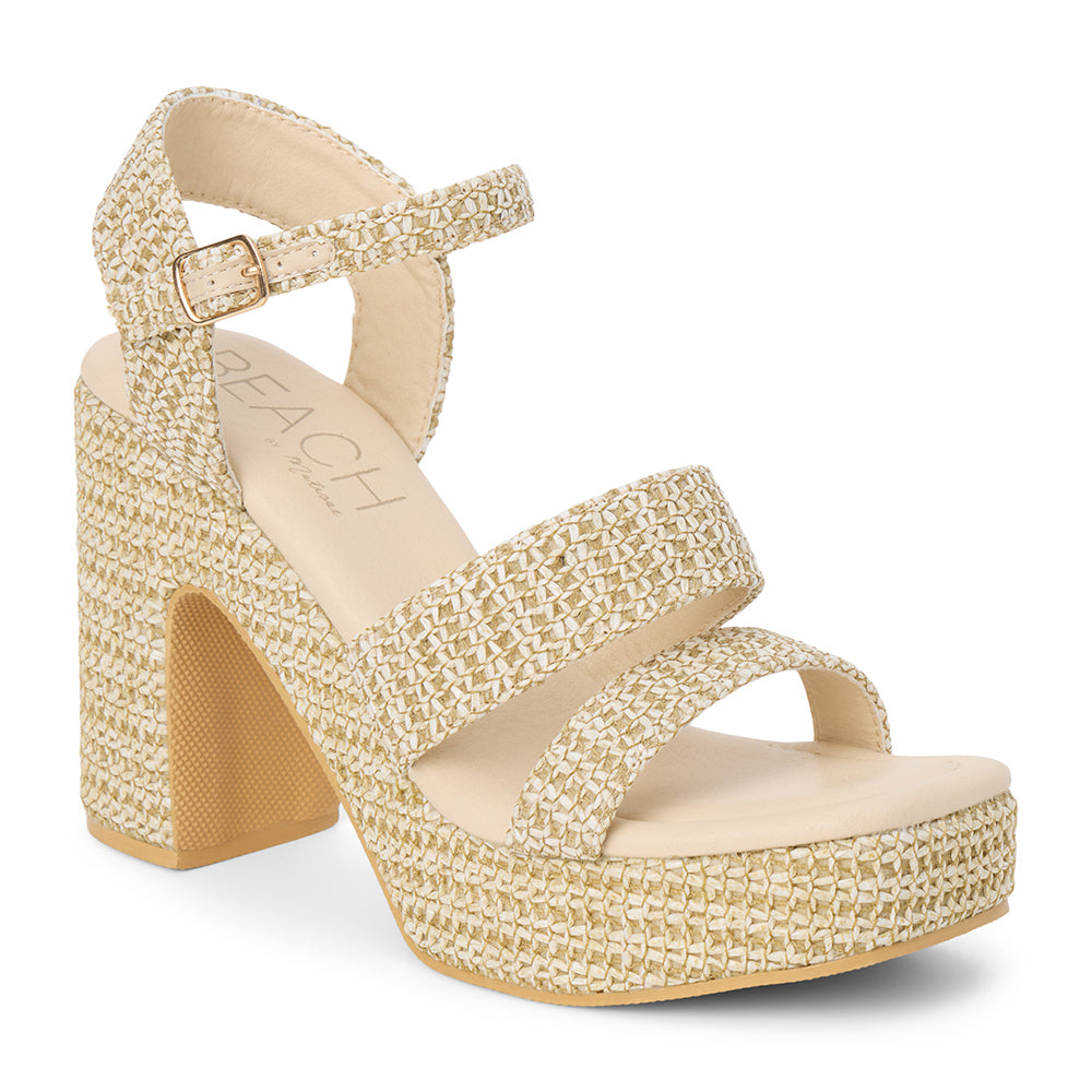 Beige platform heel sandal with woven vegan raffia texture, ankle strap, and chunky heel, shown on a white background.