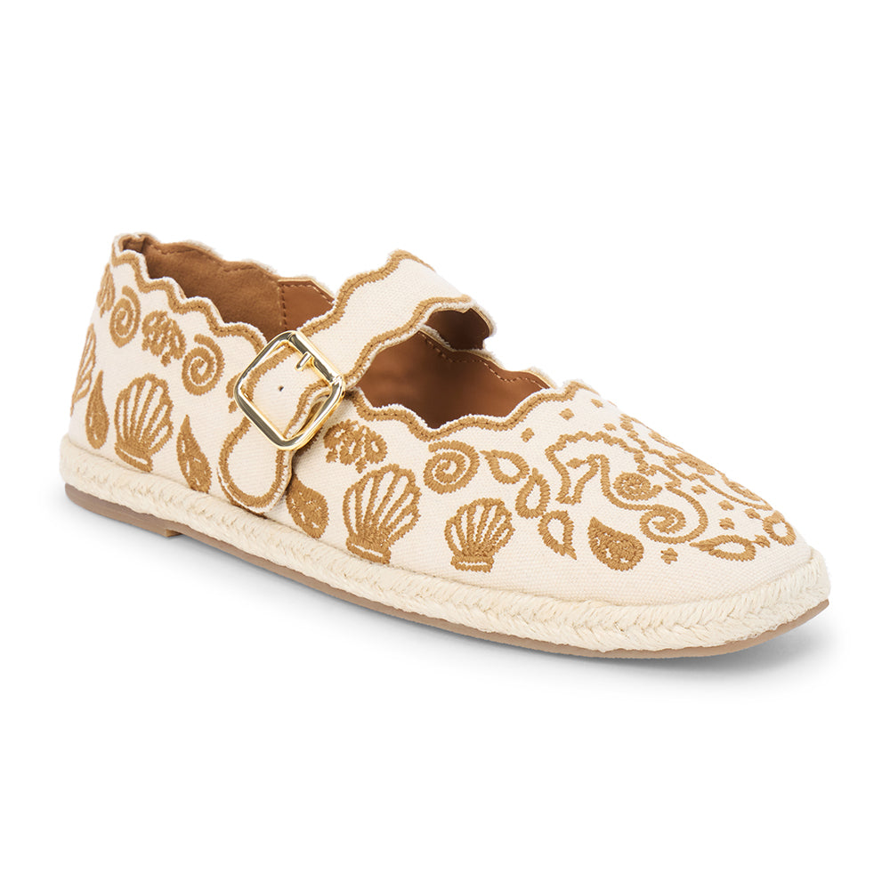 Tan embroidered canvas flat with scalloped edges and buckle strap shown on a white background.