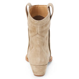 Taupe suede ankle boot with western stitching, a pointed toe, stacked heel, and pull tab, shown in side profile on a white background.