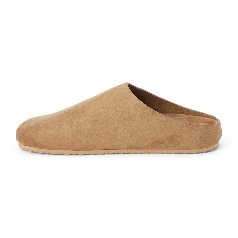 Vegan tan faux suede clog with a smooth closed toe, minimalist upper, open back, and tan low-profile sole shown on a white background.