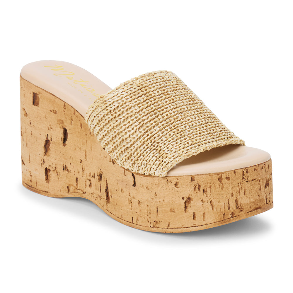 Ivory raffia platform sandal with cork wedge and wide strap shown on a white background.