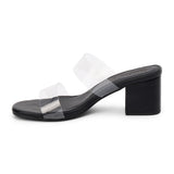 Black block heel sandal with clear PVC straps, open square toe, slip-on mule design, and mid-height heel, shown on a white background.