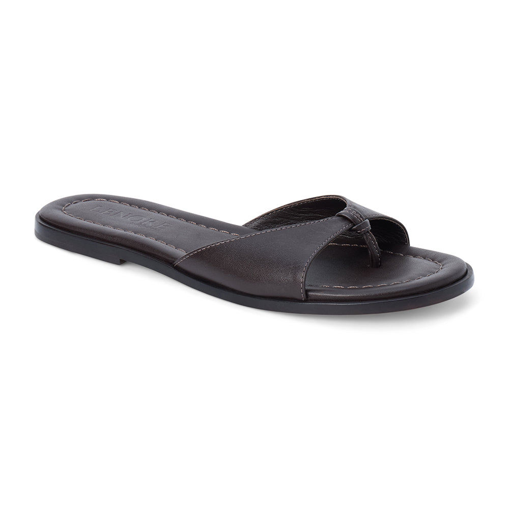 Chocolate brown leather slide sandal with minimalist thong strap and padded footbed, shown on a white background.