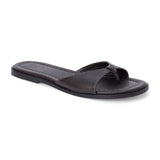 Chocolate brown leather slide sandal with minimalist thong strap and padded footbed, shown on a white background.