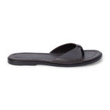 Chocolate brown leather slide sandal with minimalist thong strap and padded footbed, shown on a white background.