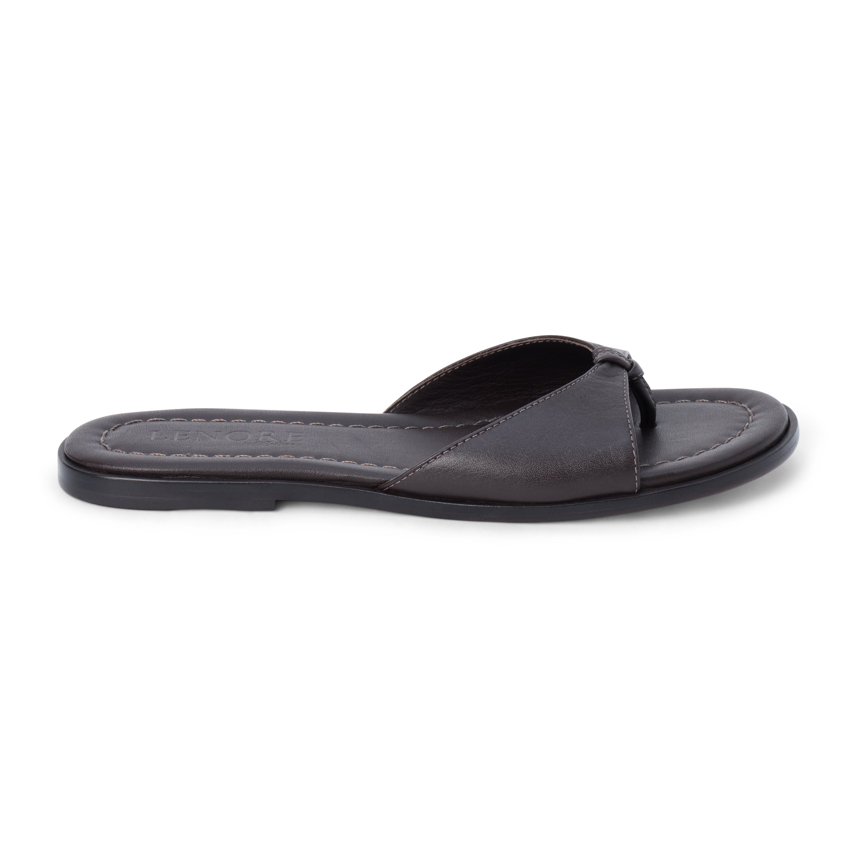 Chocolate brown leather slide sandal with minimalist thong strap and padded footbed, shown on a white background.