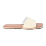 Light yellow leather slide sandal with a wide single strap and flat sole, shown on a white background.