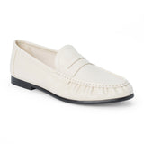 Vegan ivory faux leather penny loafer with a penny strap, moc-toe stitching, gathered toe detail, and black low heel shown on a white background.