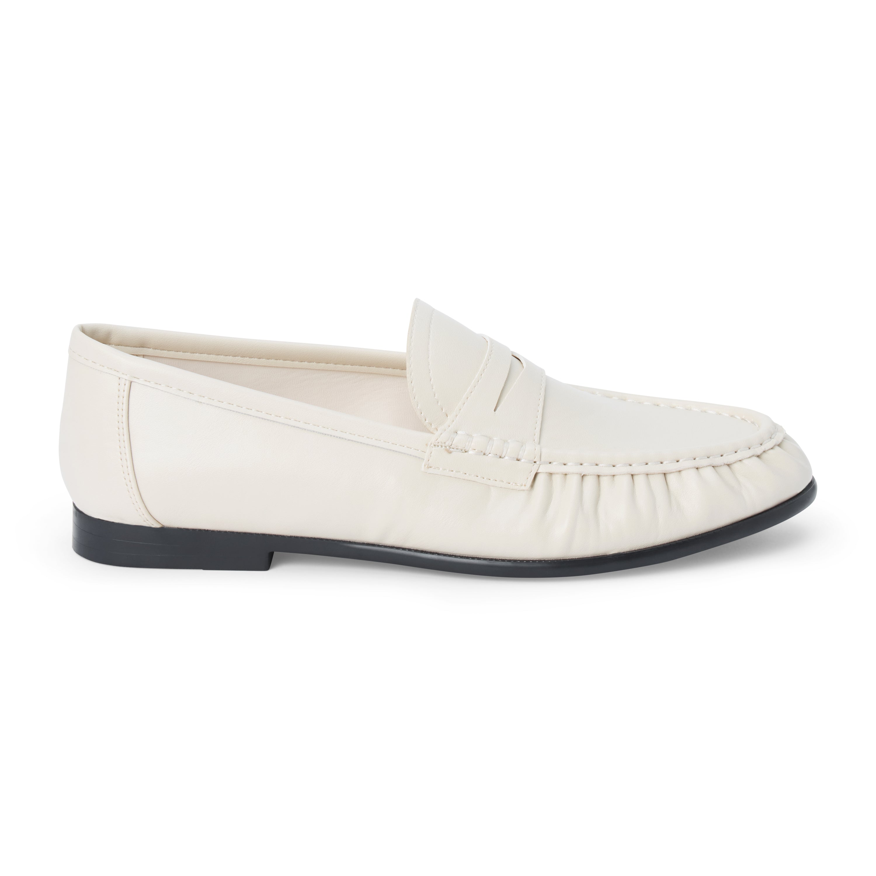 Vegan ivory faux leather penny loafer with a penny strap, moc-toe stitching, gathered toe detail, and black low heel shown on a white background.