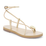Ivory leather sandal with thin straps and wraparound ankle strap shown on a white background.