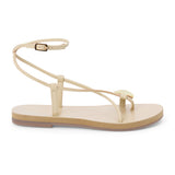 Ivory leather sandal with thin straps and wraparound ankle strap shown on a white background.