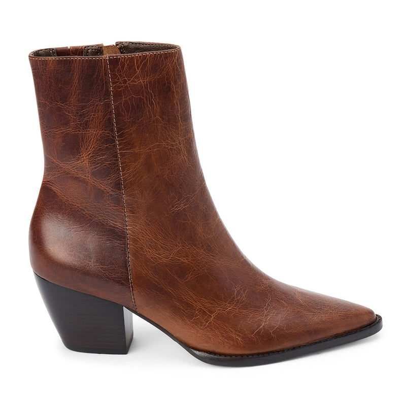 Caty Ankle Boot – Matisse Footwear – Cognac leather ankle boot with a distressed finish, pointed toe, and western block heel.