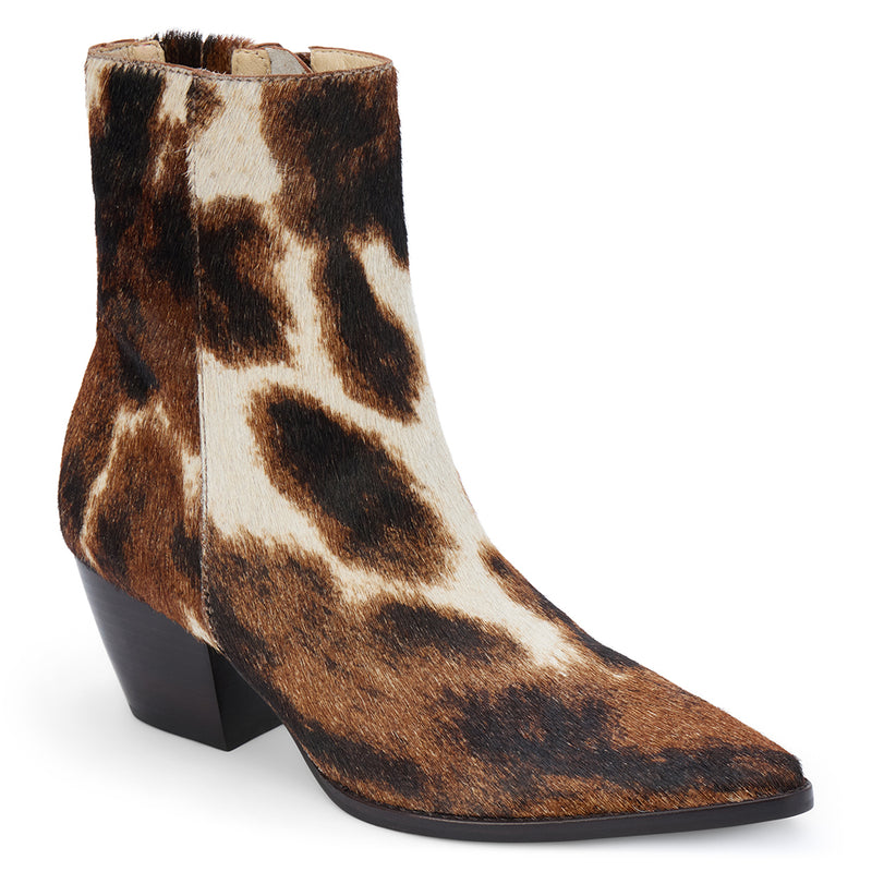 Caty Ankle Boot – Matisse Footwear – Cow-print haircalf ankle boot with a pointed toe, stacked block heel, and side zipper. A bold Western-inspired silhouette with statement-making texture.
