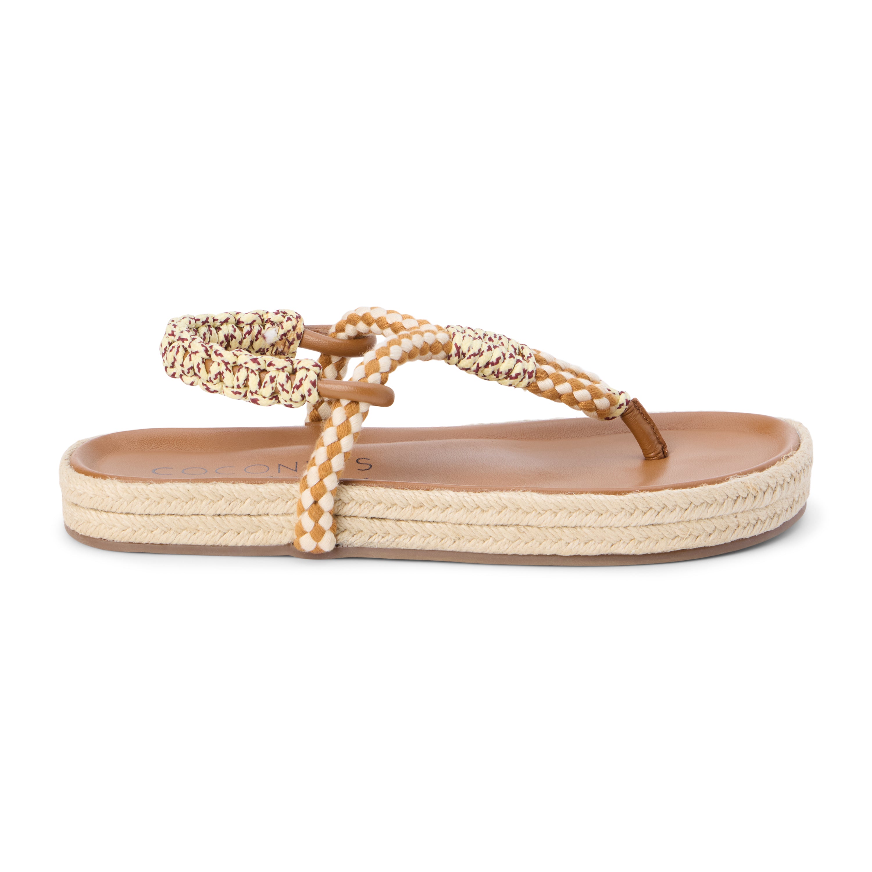Tan and ivory braided thong sandal with multicolor accents and flat sole shown on a white background.