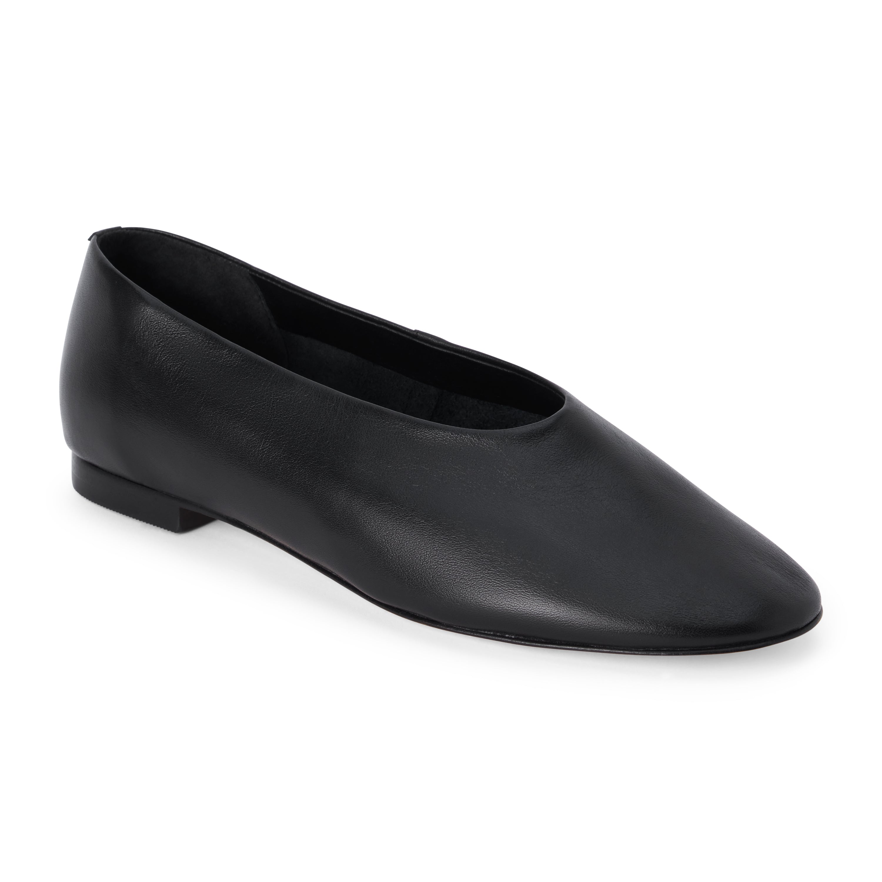Black leather flat with a softly squared toe, high-cut vamp, smooth upper, and low black heel shown on a white background.
