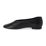 Black leather flat with a softly squared toe, high-cut vamp, smooth upper, and low black heel shown on a white background.