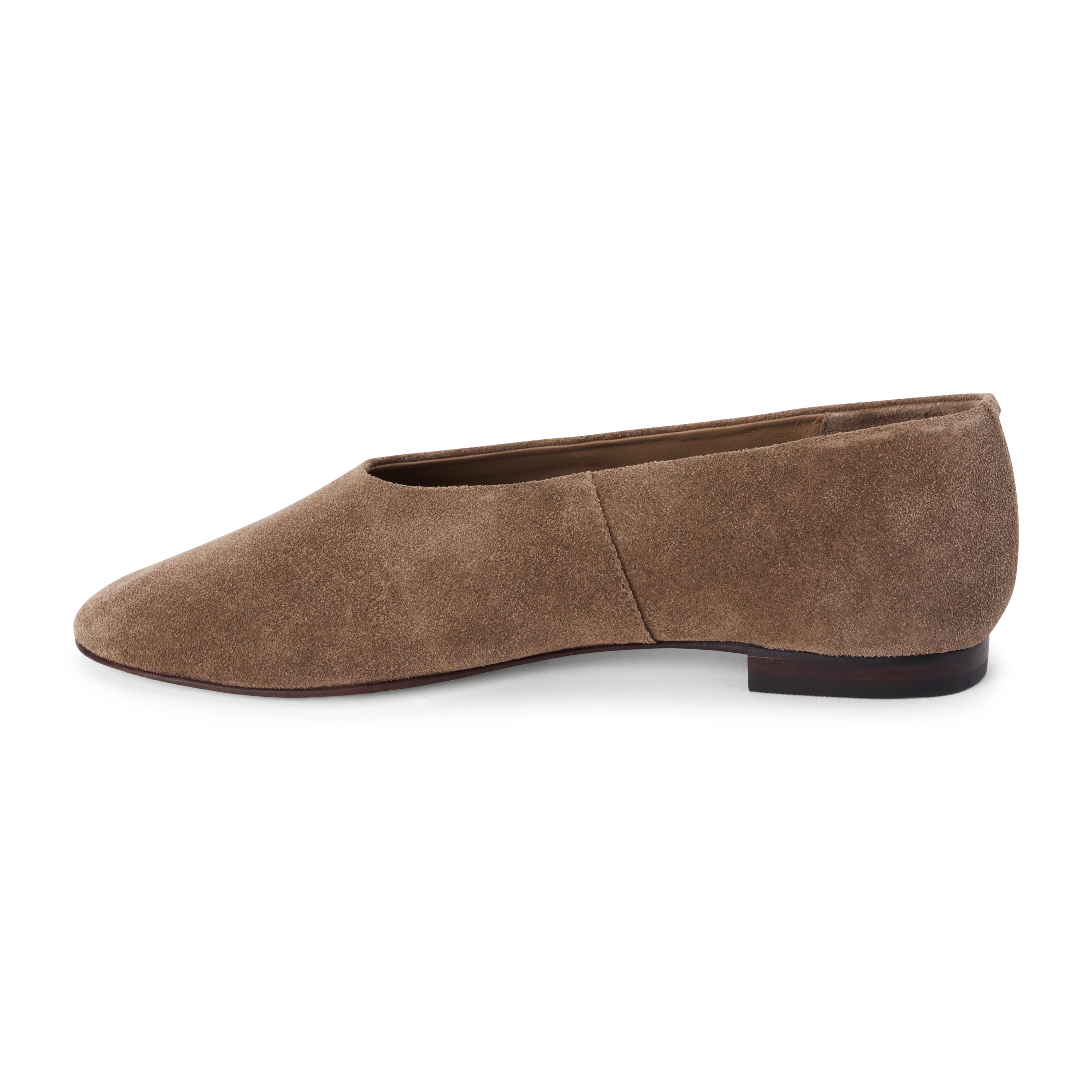 Brown suede flat with a softly squared toe, high-cut vamp, textured upper, and low dark heel shown on a white background.