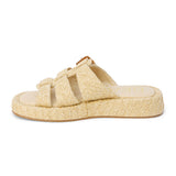 Natural raffia platform slide sandals with woven straps and an adjustable buckle detail. A breezy, laid-back style perfect for warm-weather wear.