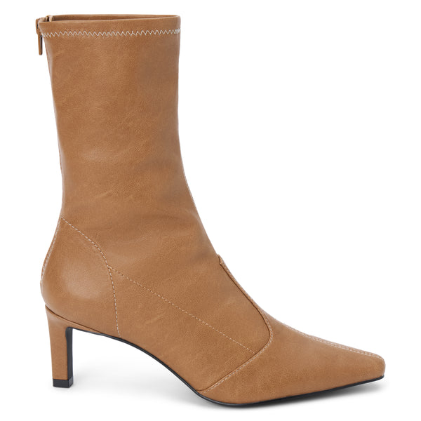 Clara Vegan Heeled Boot – Coconuts by Matisse – Tan faux leather boot with pointed toe, mid-calf shaft, and slim heel.