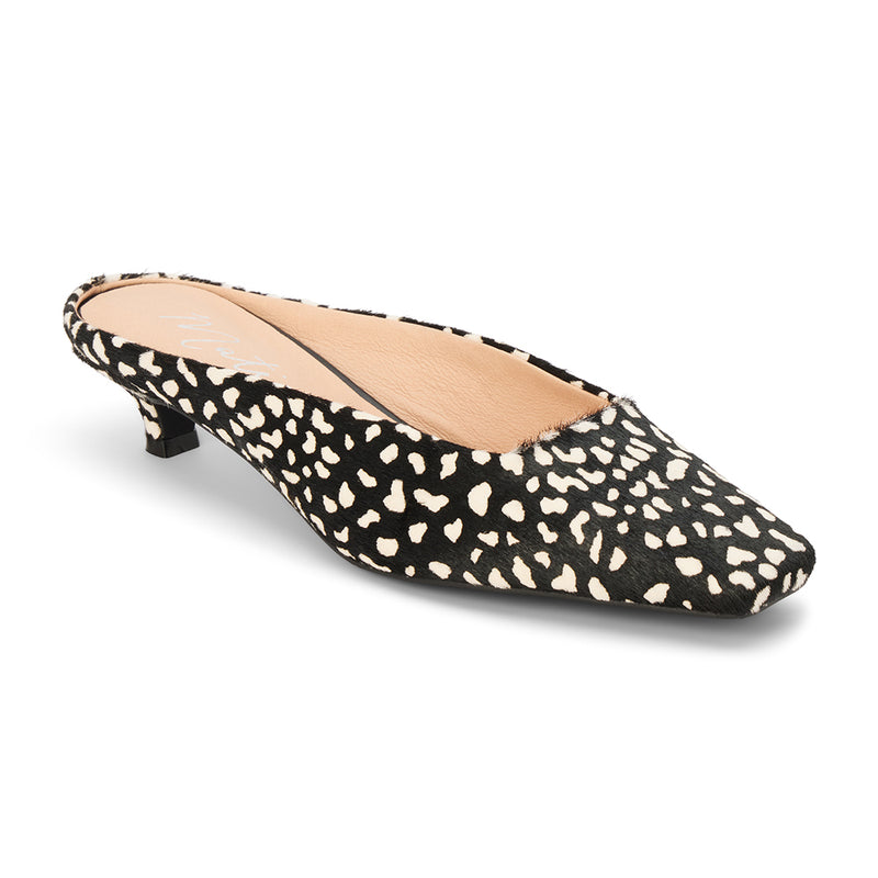 Classy Heeled Mule – Matisse Footwear – Black and ivory spotted cow hair mule with a squared toe, low kitten heel, and sleek slip-on silhouette.