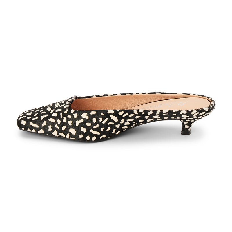 Classy Heeled Mule – Matisse Footwear – Black and ivory spotted cow hair mule with a squared toe, low kitten heel, and sleek slip-on silhouette.