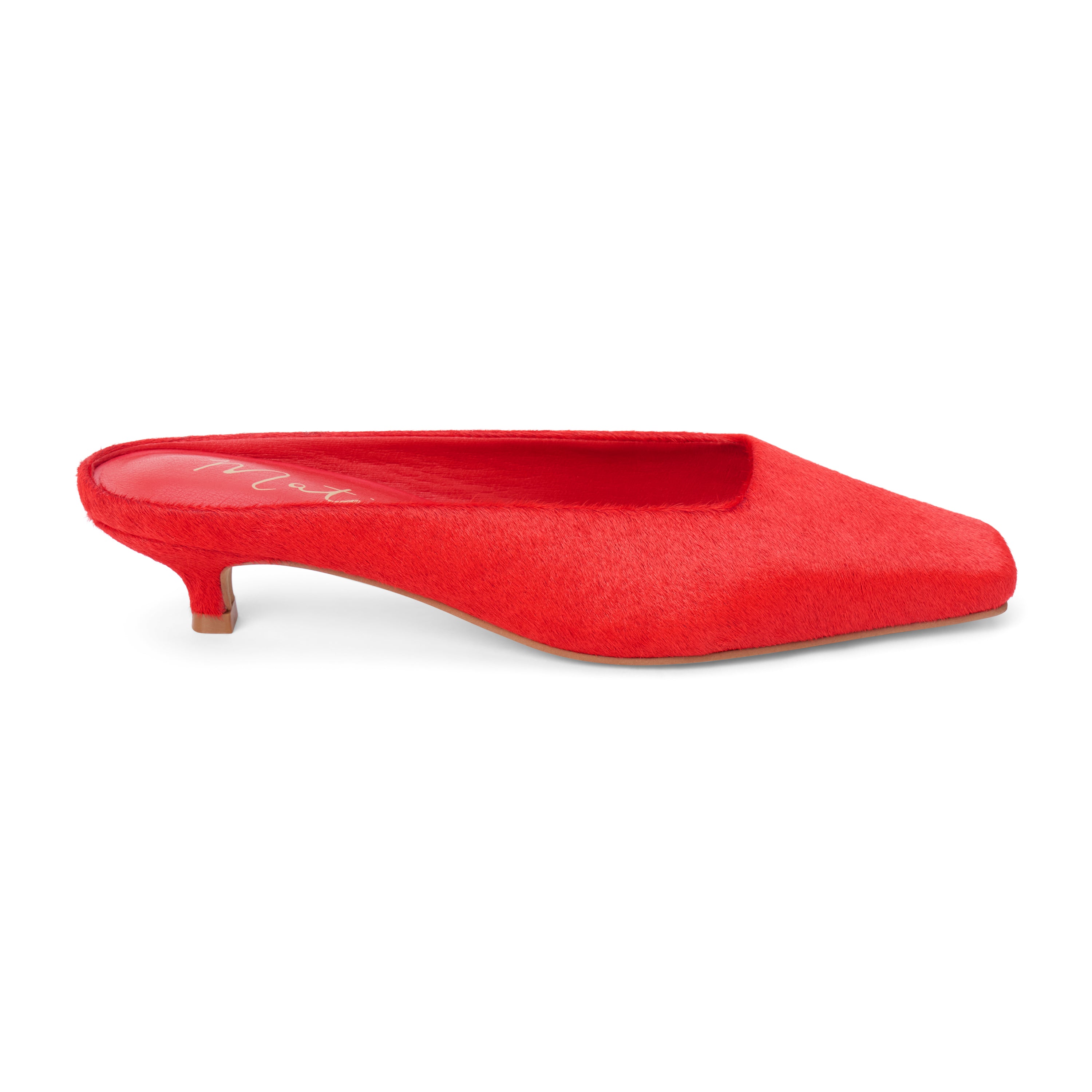 Red cow hair heeled mule with a pointed toe and low kitten heel shown on a white background.