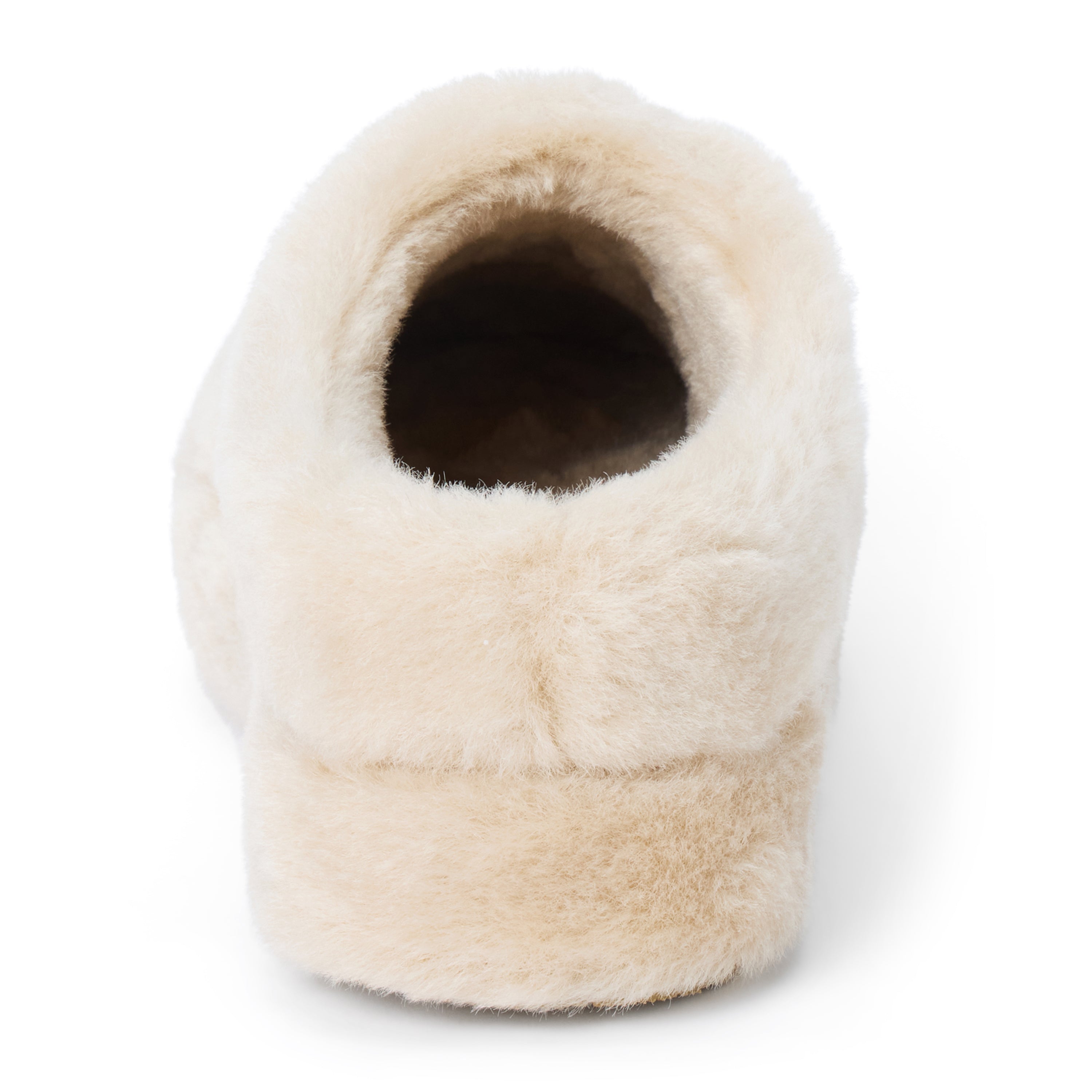 Vegan beige faux shearling mule with a closed rounded toe, open back, and plush platform sole shown on a white background.
