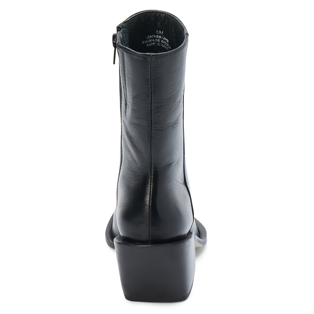 Black leather ankle boot with a pointed toe, angled block heel, and smooth minimalist upper shown on a white background.