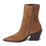 Brown suede ankle boot with a pointed toe, angled block heel, and minimalist upper shown on a white background.