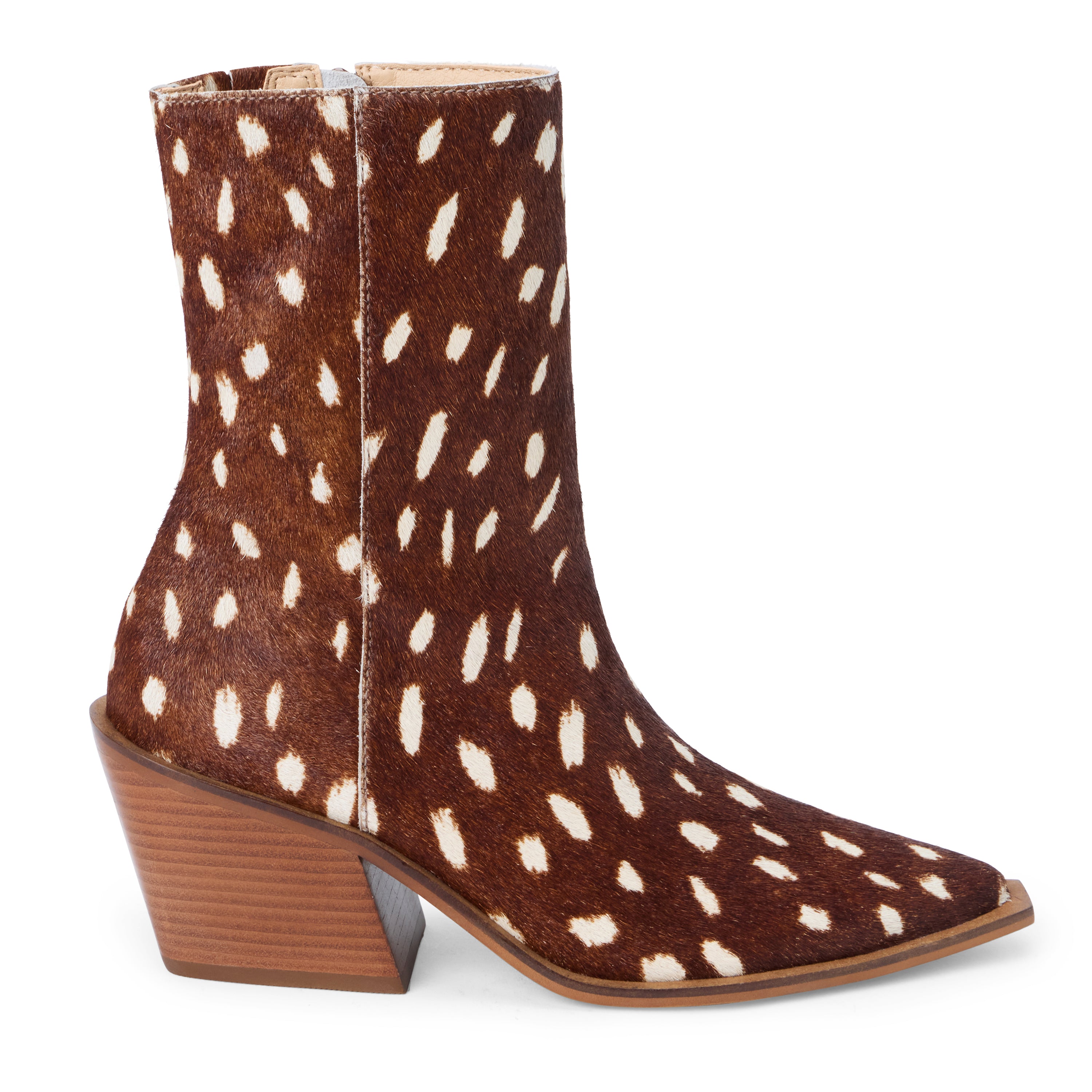 Brown and ivory spotted cow hair ankle boot with a pointed toe and angled block heel shown on a white background.