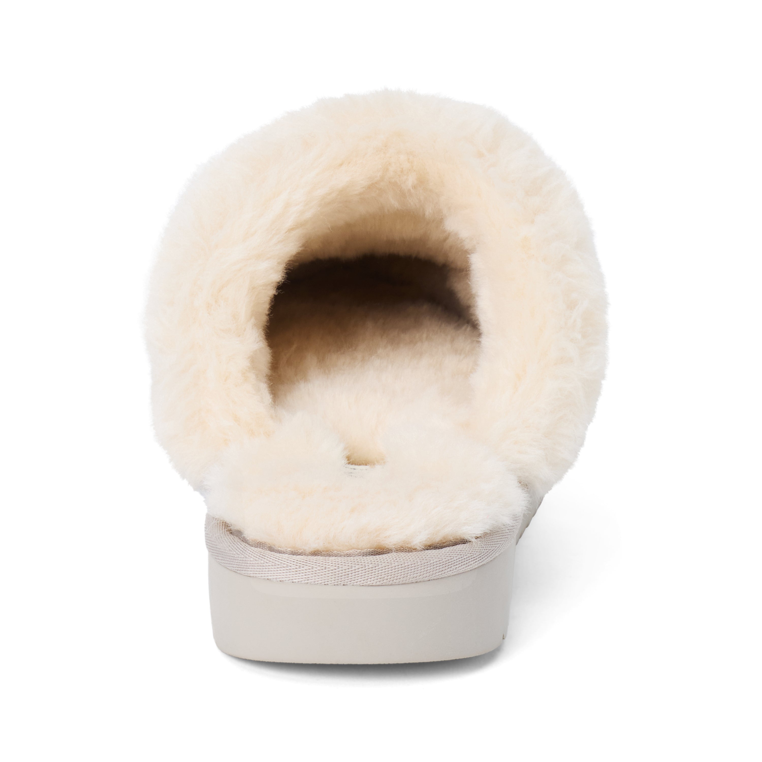 Vegan grey faux suede mule with plush faux-fur trim, gold-tone hardware, a moc toe, and platform sole shown on a white background.