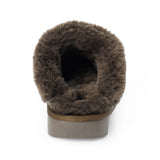 Vegan brown faux suede mule with plush faux-fur trim, gold-tone hardware, a moc toe, and platform sole shown on a white background.