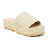 Green and ivory platform slide sandal with woven vegan raffia upper and thick sole, shown on a white background.