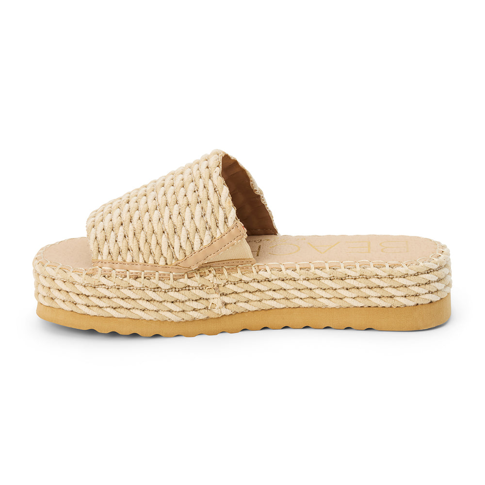 Tan platform slide sandal with woven vegan textile upper and rope-style platform, shown on a white background.