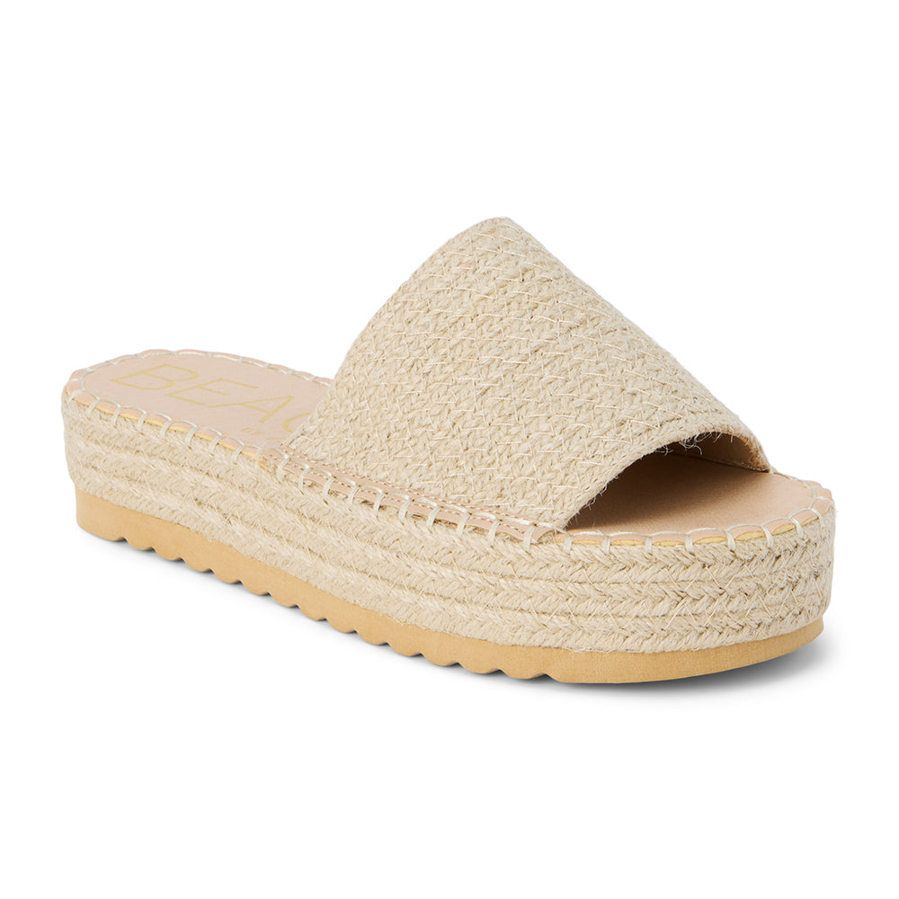 Ivory platform slide sandal with woven vegan jute upper and thick sole, shown on a white background.
