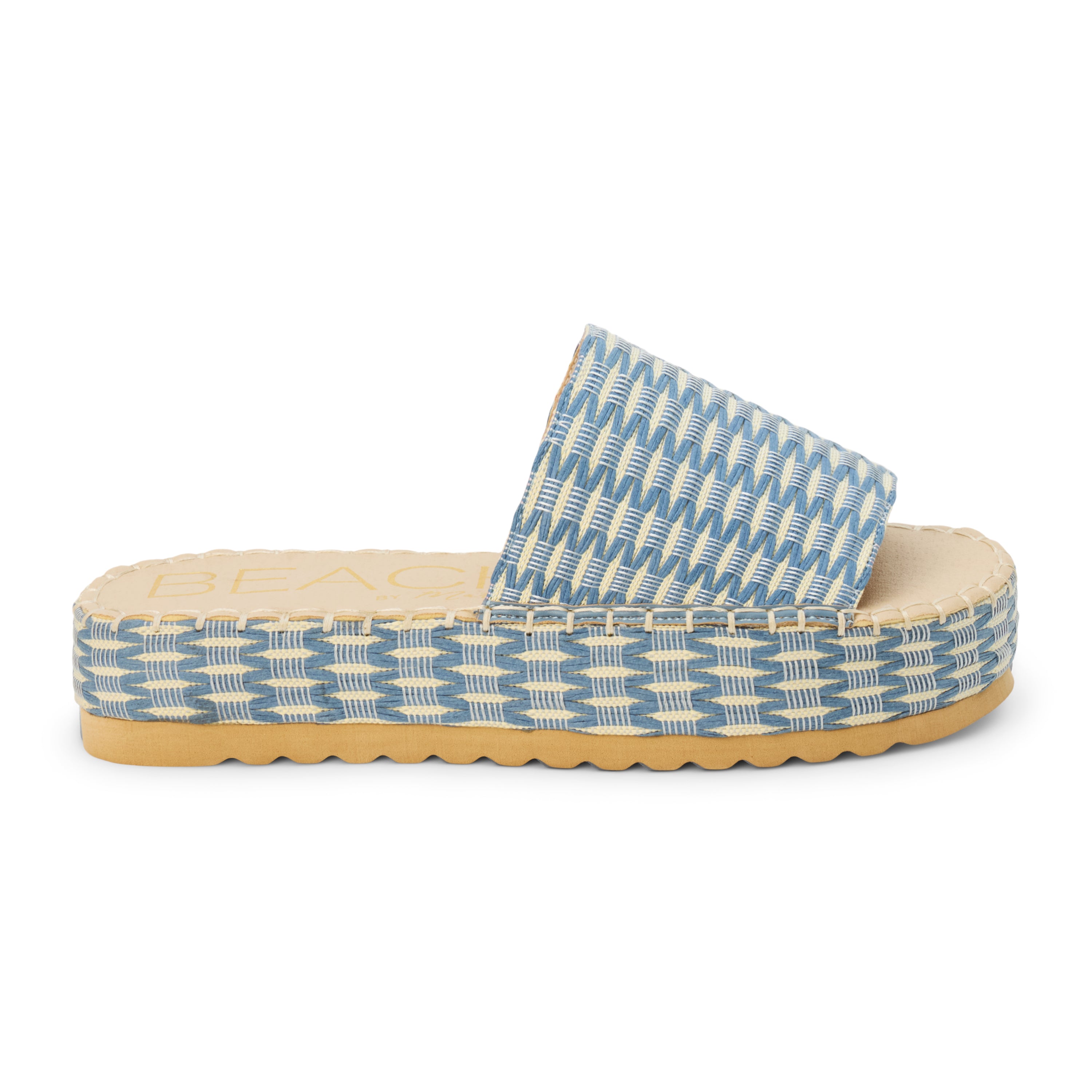 Blue and ivory platform slide sandal with woven vegan raffia upper and thick sole, shown on a white background.