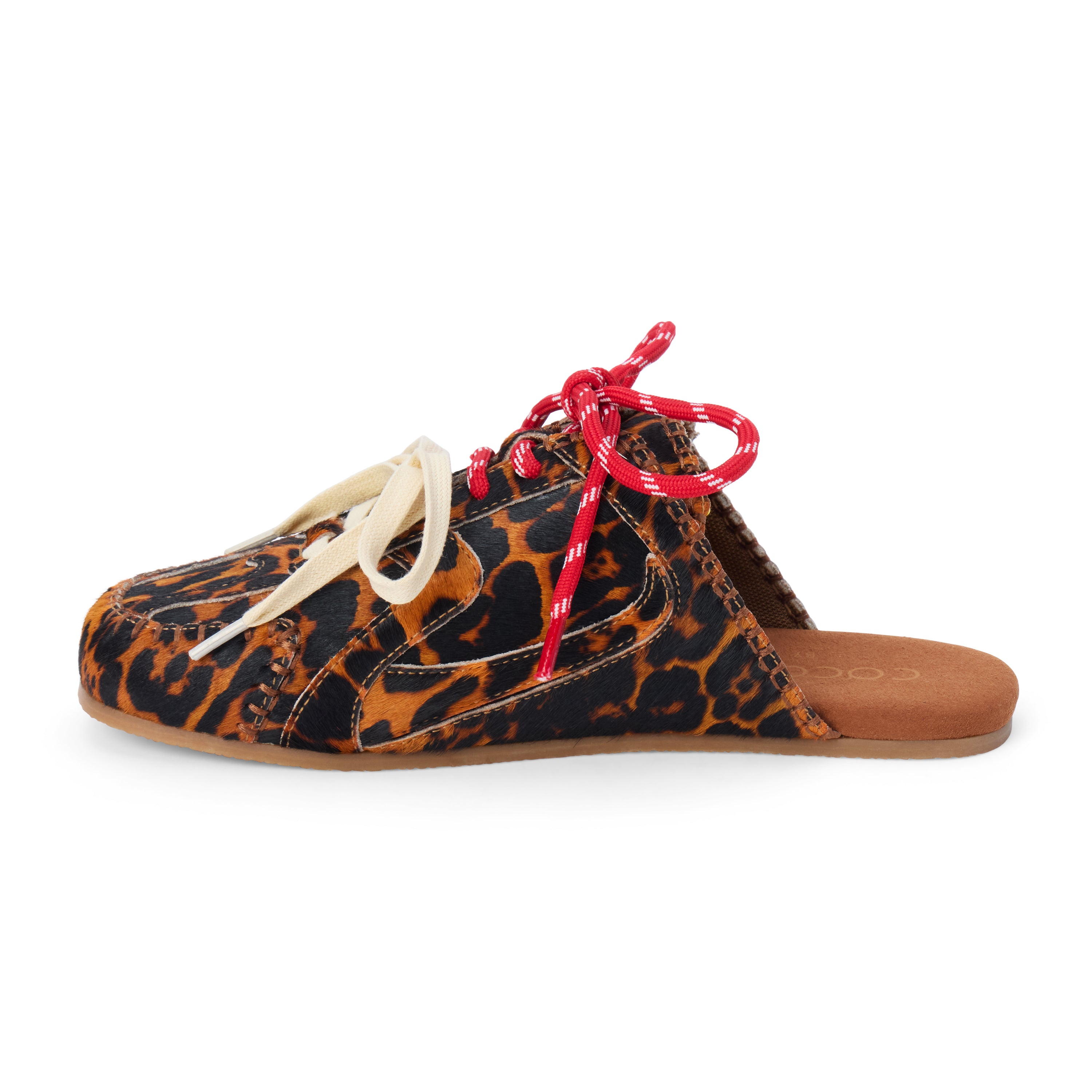 Brown and black animal-print cow hair sneaker mule with contrasting red and ivory laces and a flat sole shown on a white background.