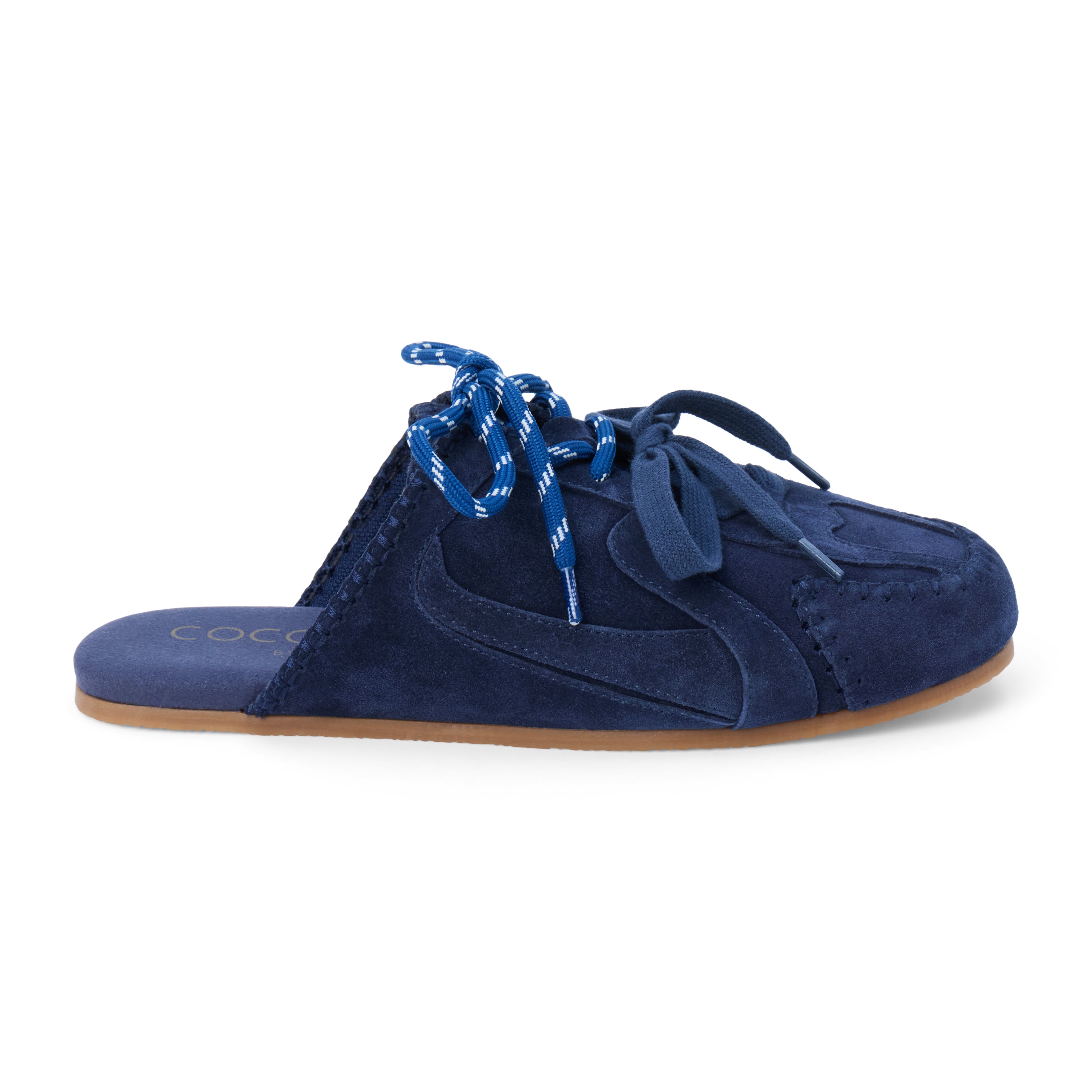 Blue suede sneaker mule with tonal blue laces, stitched trim, and a flat sole shown on a white background.
