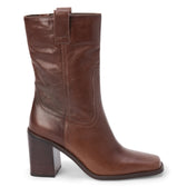 Brown leather heeled boot with a square toe, pull tab, curved western stitching, and tall dark brown block heel shown on a white background.