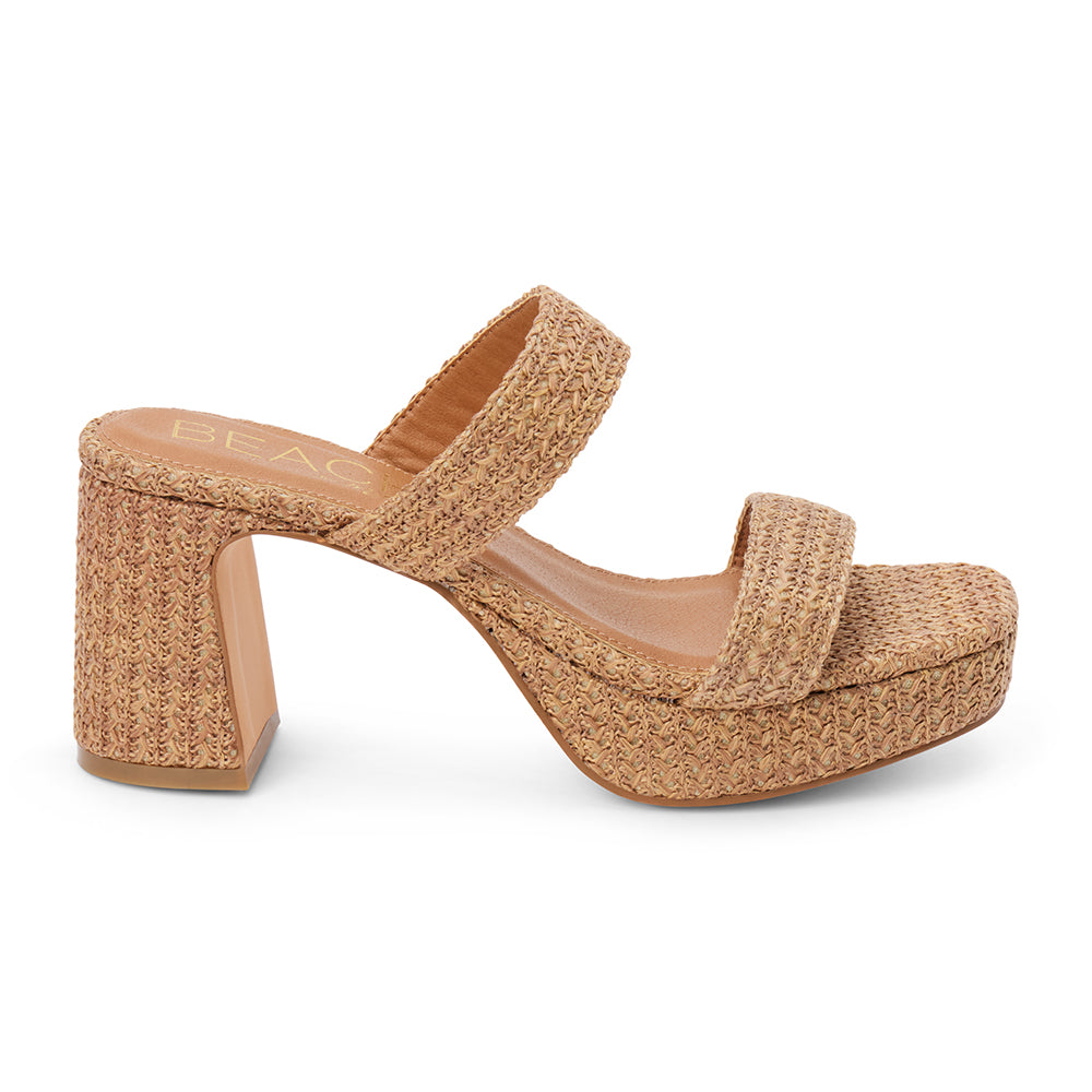 Brown woven platform sandal with dual straps and a chunky block heel, shown on a white background.