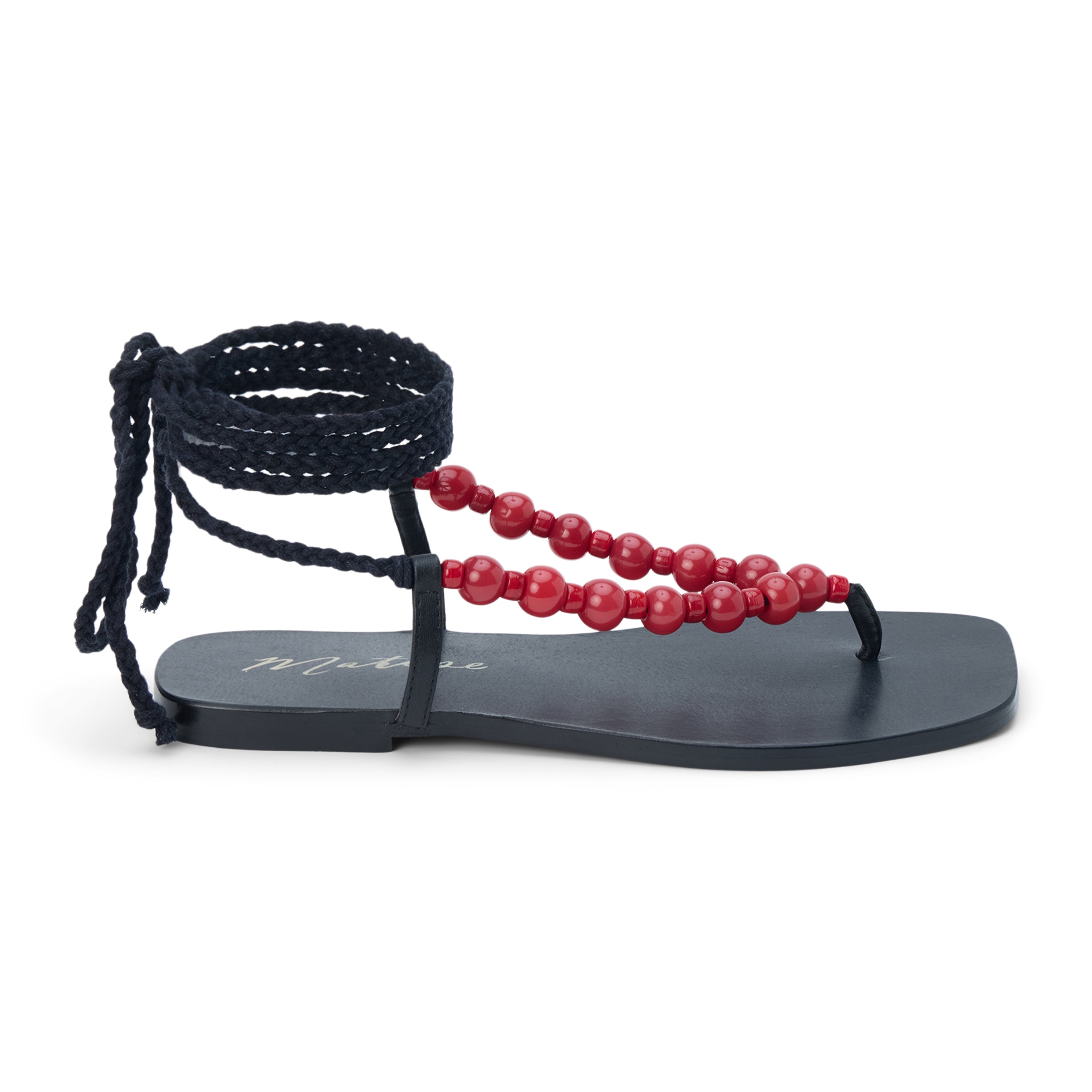 Black thong sandal with braided ankle wrap straps and red bead accents shown on a white background.