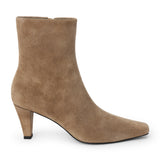 Taupe suede ankle boot with a squared toe, slim tapered heel, and minimalist upper shown on a white background.