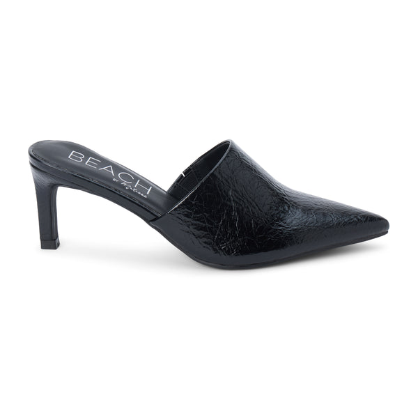 Garret Heeled Mule – Beach by Matisse – Black pointed-toe slip-on mule with textured finish and stiletto heel.