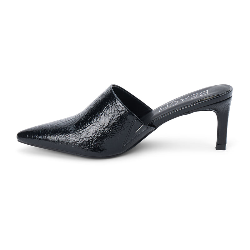Garret Heeled Mule – Beach by Matisse – Black pointed-toe slip-on mule with textured finish and stiletto heel.