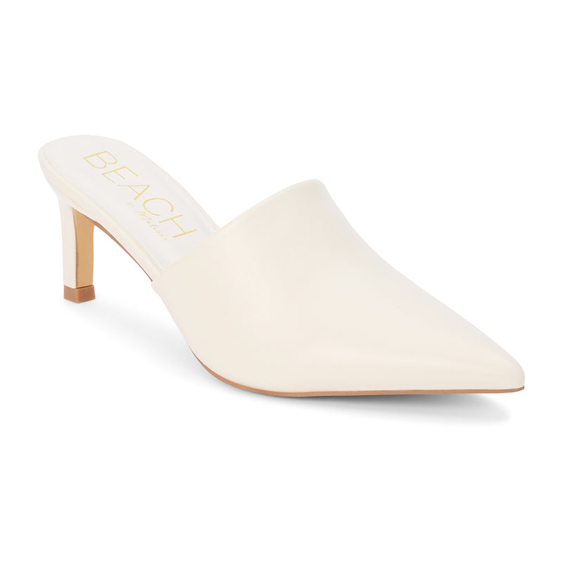 Garret Heeled Mule – Beach by Matisse – Ivory pointed-toe slip-on mule with smooth finish and stiletto heel.