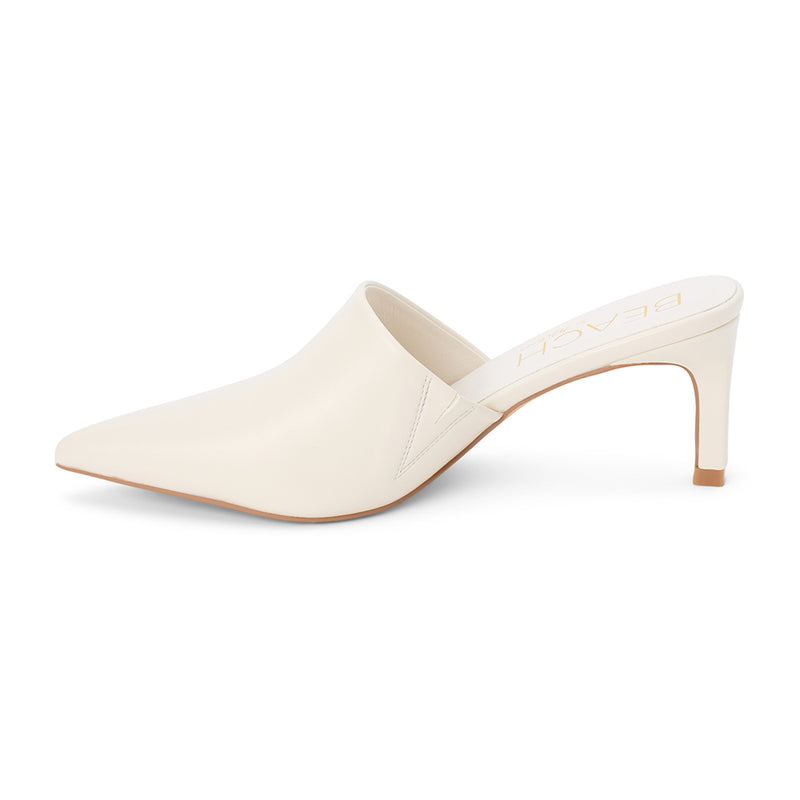 Garret Heeled Mule – Beach by Matisse – Ivory pointed-toe slip-on mule with smooth finish and stiletto heel.